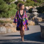 Alternative looking hippy woman in an outdoor setting wearing Alex Tooth Inner Flight Flow Kimono Robe.