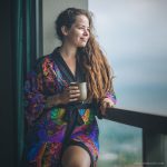 Alternative looking hippy woman in an outdoor setting wearing Alex Tooth Inner Flight Flow Kimono Robe.