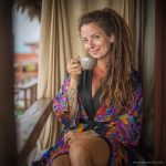 Alternative looking hippy woman in an outdoor setting wearing Alex Tooth Inner Flight Flow Kimono Robe.