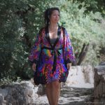 Alternative looking hippy woman in an outdoor setting wearing Alex Tooth Inner Flight Flow Kimono Robe.