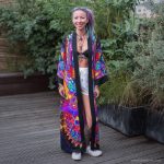 Hippy woman outside with tattoos wearing Alex Tooth Inner Flight MoonFlow Kimono robe.