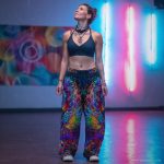 Alternative looking hippy style woman wearing Alex Tooth Inner Flight FlowState Pants.
