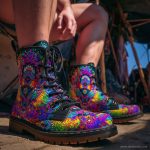 A pair of combat boots at a music festival, the boots are Alex Tooth Inner flight Spirit Boots.