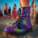 A pair of combat boots at a music festival, the boots are Alex Tooth Inner flight Spirit Boots.